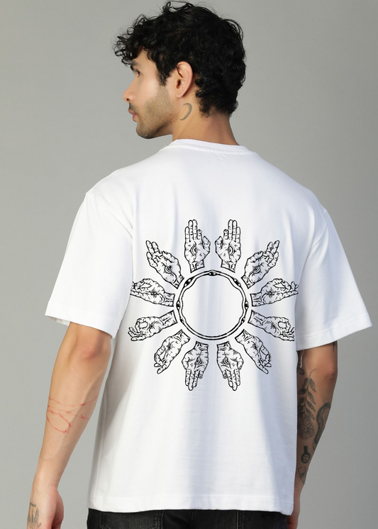 Person wearing a white t-shirt with a black circular design on the back against a gray background